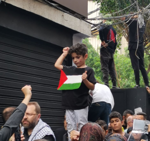 A Lebanese Child Holding the Palestinian Flag